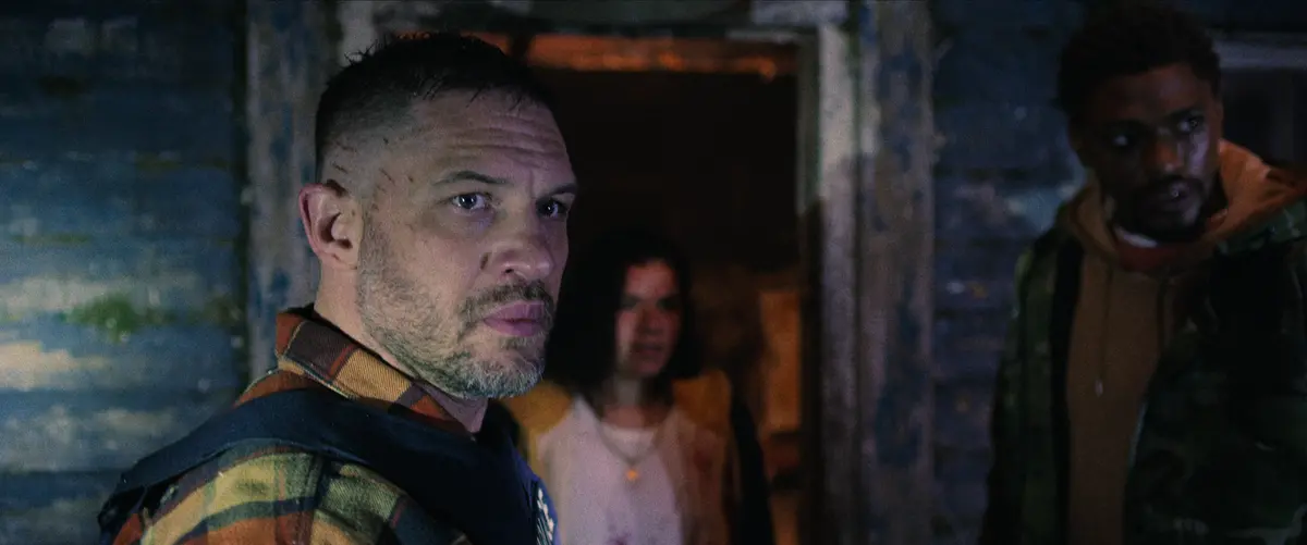 HAVOC. Tom Hardy as Walker, Quelin Sepulveda as Mia and Justin Cornwell as Charlie in HAVOC. Cr. Courtesy of Netflix © 2025