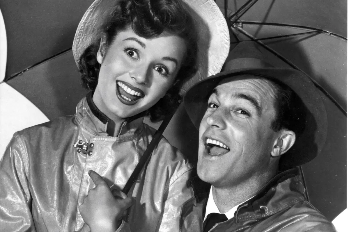 Debbie Reynolds e Gene Kelly in Cantando sotto la pioggia