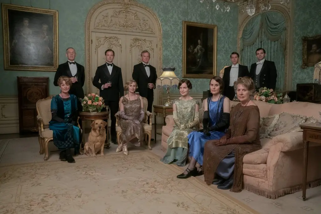 (l-r.) Samantha Bond stars as Lady Rosamund, Douglas Reith as Lord Merton, Harry Hadden-Paton as Lord Hexham, Laura Carmichael as Lady Edith Hexham, Hugh Bonneville as Lord Grantham, Elizabeth McGovern as Lady Grantham, Michelle Dockery as Lady Mary Talbot, Penelope Wilton as Lady Merton, Robert James Collier as Thomas Barrow and Michael Fox as Andy in DOWNTON ABBEY: A New Era, a Focus Features release.  <br>Credit: Ben Blackall / \\u00A9 2021 Focus Features, LLC