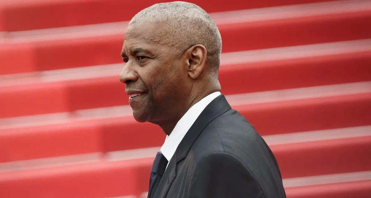 Denzel Washington (Palma d'Onore a sorpresa) sul red carpet per Highest 2 Lowest di Spike Lee [foto]
