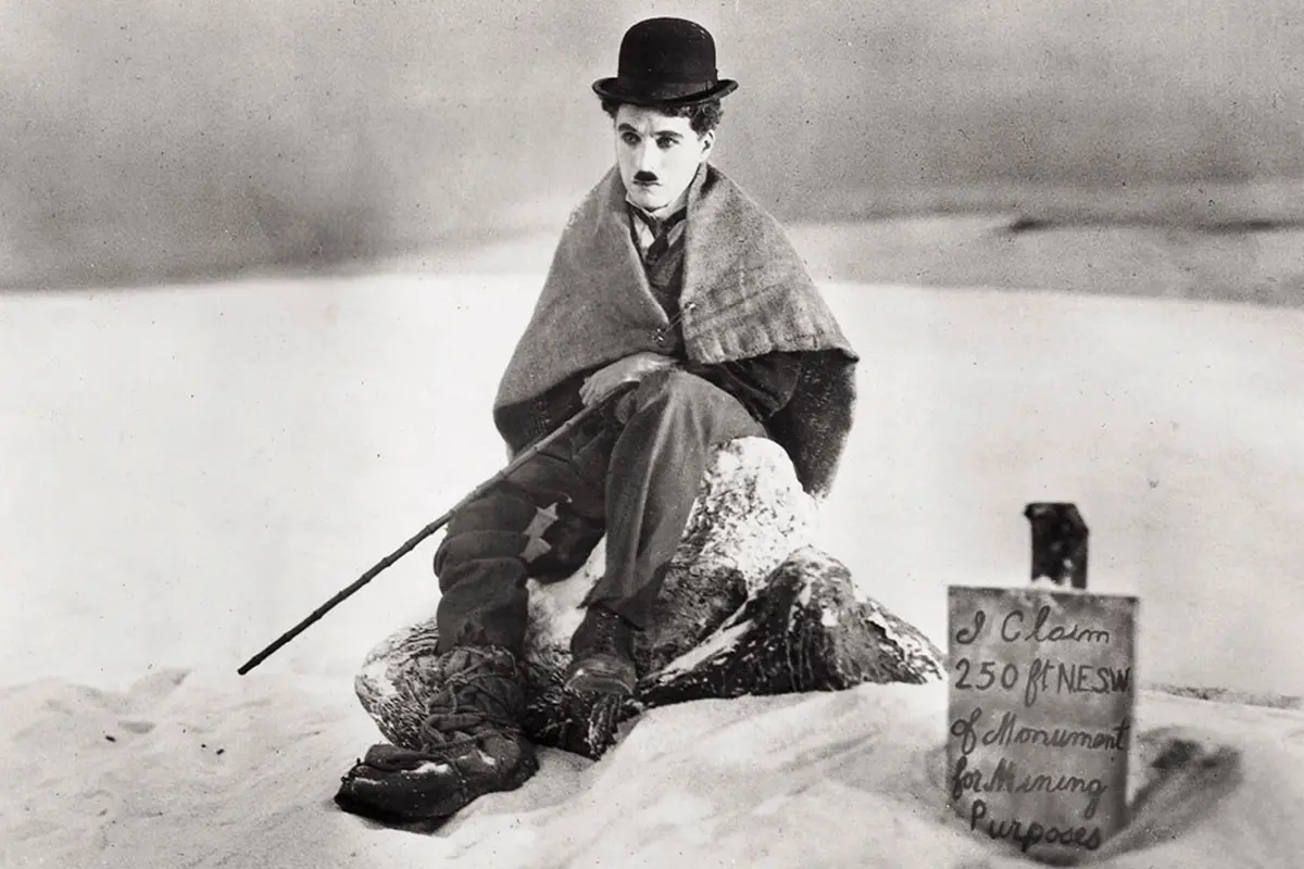 ** FILE **Legendary silent film actor-director Charlie Chaplin is shown in a scene from the 1925 silent film \"The Gold Rush,\" in this promotional photo. Four of Chaplin\\'s films \"The Gold Rush,\" \"The Great Dictator,\" \"Modern Times,\" and \"Limelight,\" are being released on DVD July 1, 2003, from Warner Home Video, as the first in a series of ten titles included in \"The Chaplin Collection.\" (AP Photo/The Roy Export Company Establishment, HO). HOUCHRON CAPTION (03/03/2004): After the premiere of \"Charlie: The Life and Art of Charles Chaplin\" at 7 tonight on TCM, the tribute continues with a Chaplin film festival featuring 36 short films. , AP