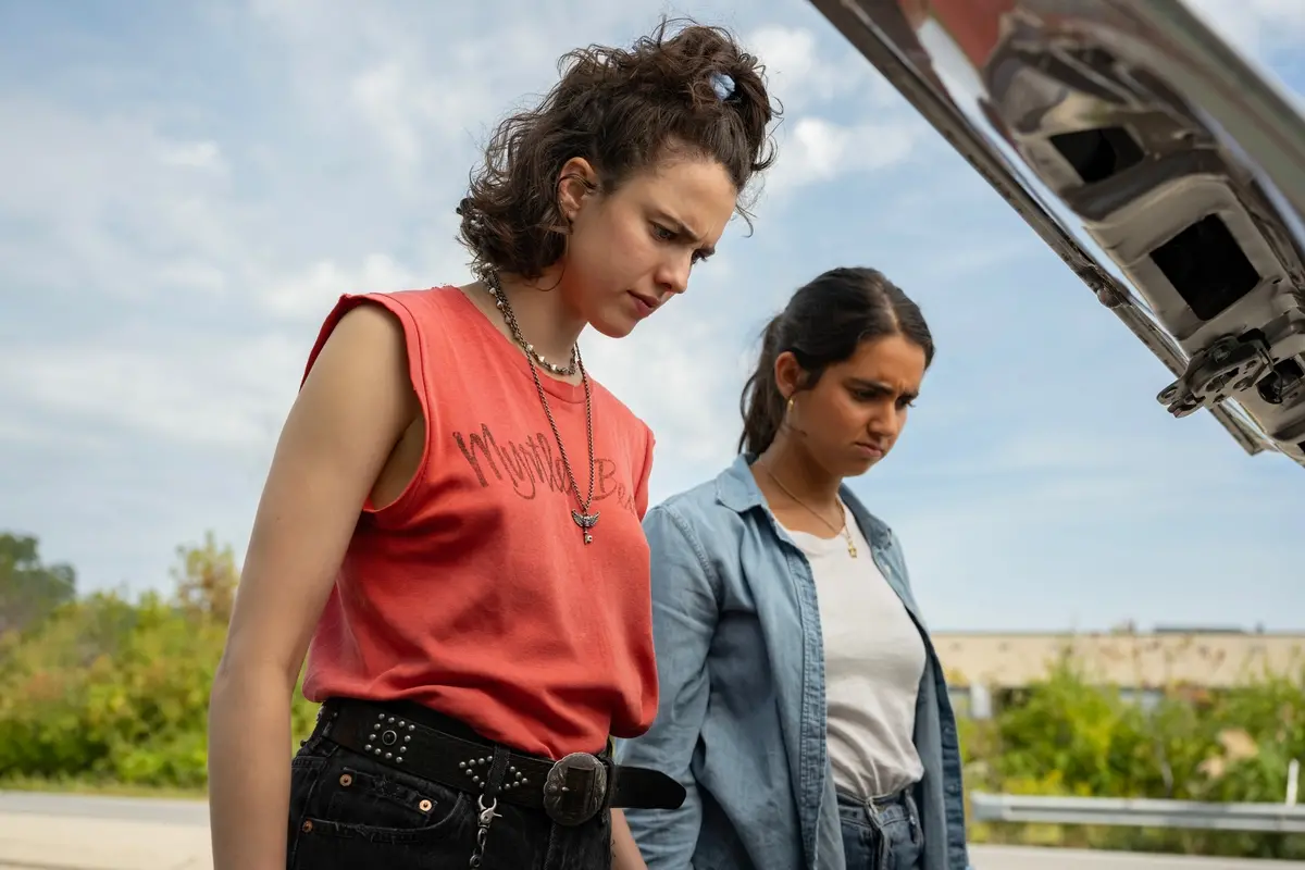 (L to R) Margaret Qualley as \\\"Jamie\\\" and Geraldine Viswanathan as \\\"Marian\\\" in director Ethan Coen's DRIVE-AWAY DOLLS, a Focus Features release. Credit: Wilson Webb / Working Title / Focus Features