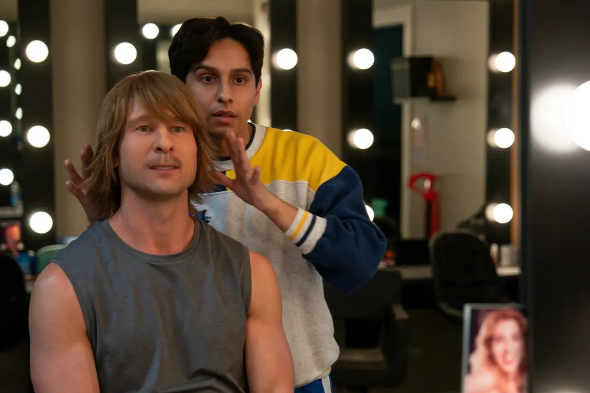 CHAD POWERS - Eight years after an unforgivable mistake nukes his promising college football career, hotshot quarterback Russ Holliday tries to resurrect his dreams by disguising himself as Chad Powers - a talented oddball who walks on to the struggling South Georgia Catfish. (Disney/Zac Popik) GLEN POWELL, FRANKIE A. RODRIGUEZ