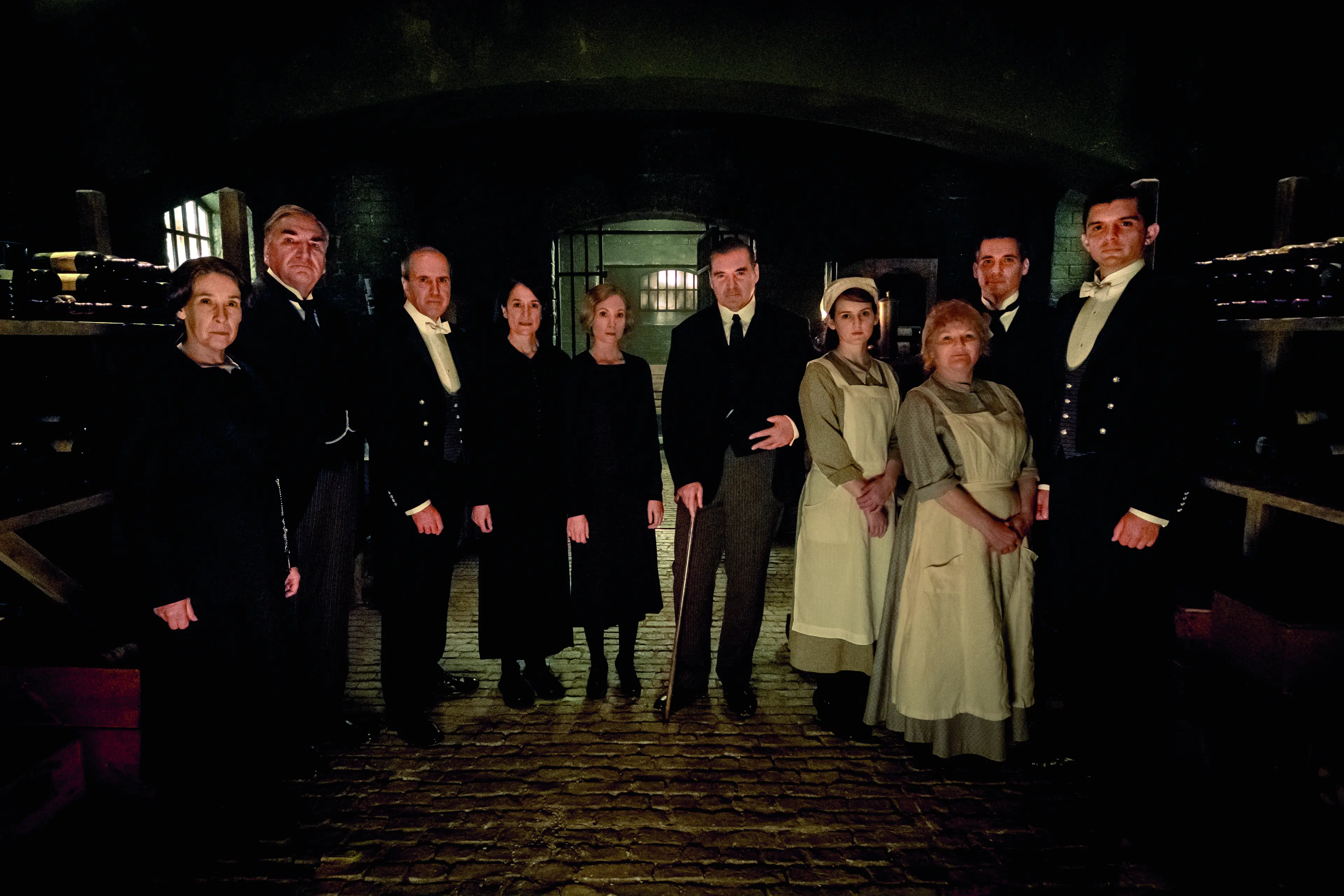 Phyllis Logan stars as Mrs. Hughes, Jim Carter as Mr. Carson, Kevin Doyle as Mr. Molesley, Raquel Cassidy as Miss Baxter, Joanne Froggatt as Anna Bates, Brendan Coyle as Mr. Bates, Sophie McShera as Daisy, Lesley Nicol as Mrs. Patmore, Robert James-Collier as Thomas Barrow and Michael C. Fox as Andy in DOWNTON ABBEY, a Focus Features release.  Credit : Jaap Buitendijk / © 2019 Focus Features, LLC