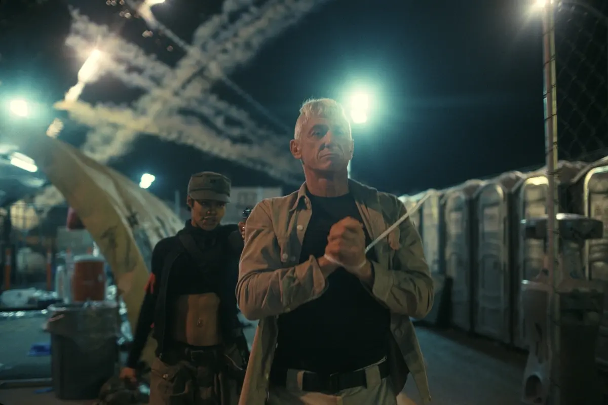 TEYANA TAYLOR as Perfidia and SEAN PENN as Col. Steven J. Lockjaw in “One Battle After Another.” A Warner Bros. Pictures Release. Photo Courtesy Warner Bros. Pictures