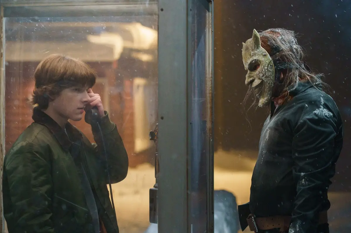 (from left) Finn (Mason Thames) and The Grabber (Ethan Hawke) in Black Phone 2, directed by Scott Derrickson. © 2025 Universal Studios. All Rights Reserved.