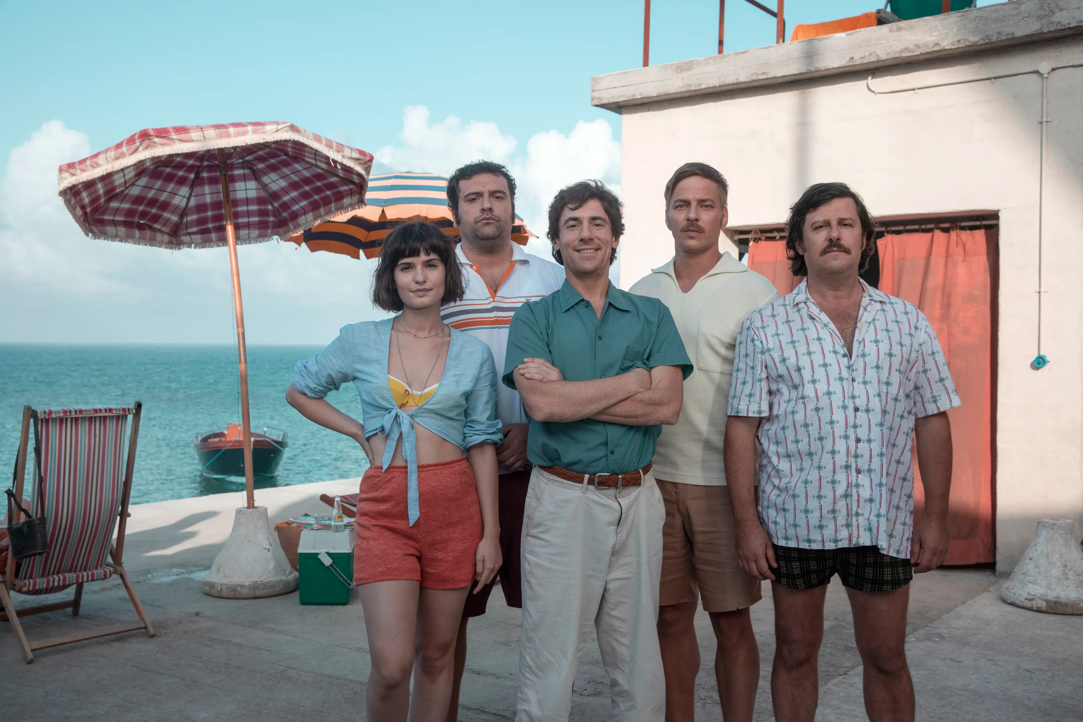 L\\'ISOLA DELLE ROSA (ROSE ISLAND) (L to R) VIOLETTA ZIRONI as FRANCA, LEONARDO LIDI as MAURIZIO ORLANDINI, ELIO GERMANO as GIORGIO, ROSATOM WLASCHIHA as W.R. NEUMANN, and ALBERTO ASTORRI as PIETRO BERNARDINI in L\\'ISOLA DELLE ROSA (ROSE ISLAND). Cr. SIMONE FLORENA/NETFLIX \\u00A9 2020