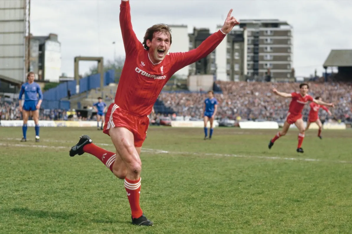 LONDON, ENGLAND - MAY 03: Liverpool player manager Kenny Dalglish celebrates after scoring the winning goal that gives Liverpool the Division One Championship for the 1985/86 season after beating Chelsea 1-0 at Stamford Bridge on May 3, 1986 in London, England. (Photo by David Cannon/Getty Images) , Hulton Archive