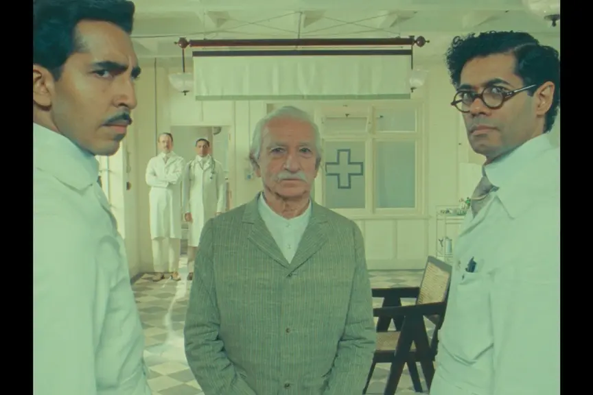 Roald Dahl's The Wonderful Story of Henry Sugar (L-R) Dev Patel as Dr. Chatterjee, Sir Ben Kingsley as Imdad Khan and Richard Ayoade as Dr. Marshall in Roald Dahl's The Wonderful Story of Henry Sugar. Cr. Netflix ©2023