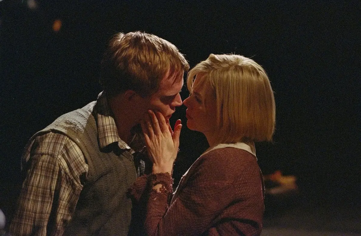 102-09 DOGVILLE by Lars von Trier Tom Edison Jr. (Paul Bettany) and Grace (Nicole Kidman) in a warm embrace Photo Credit: Rolf Konow Zentropa Entertainments8 ApS