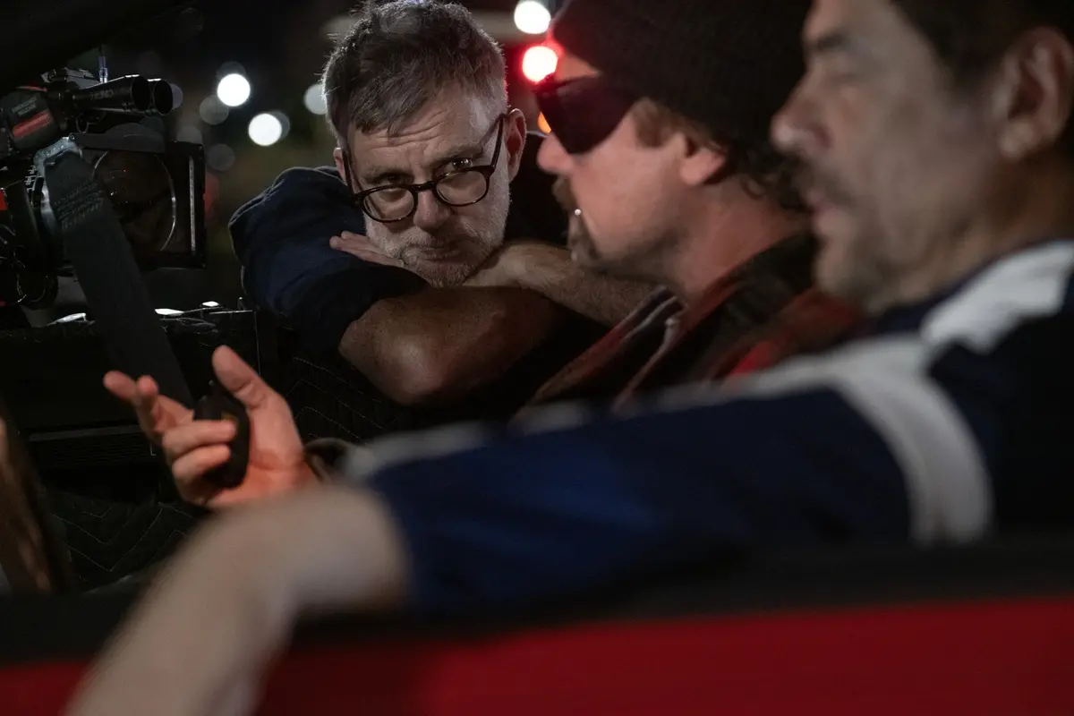 (L-r) Director/Writer/Producer PAUL THOMAS ANDERSON, LEONARDO DI CAPRIO and BENICIO DEL TORO on the set of \\u201COne Battle After Another.\\u201D A Warner Bros. Pictures Release. , Merrick Morton