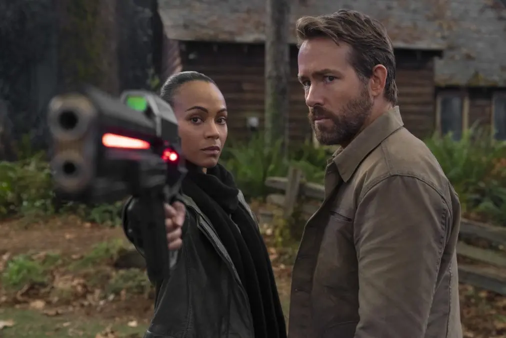 The Adam Project (L to R) Zoe Saldana as Laura and Ryan Reynolds as Big Adam. Cr. Doane Gregory/Netflix \\u00A9 2021