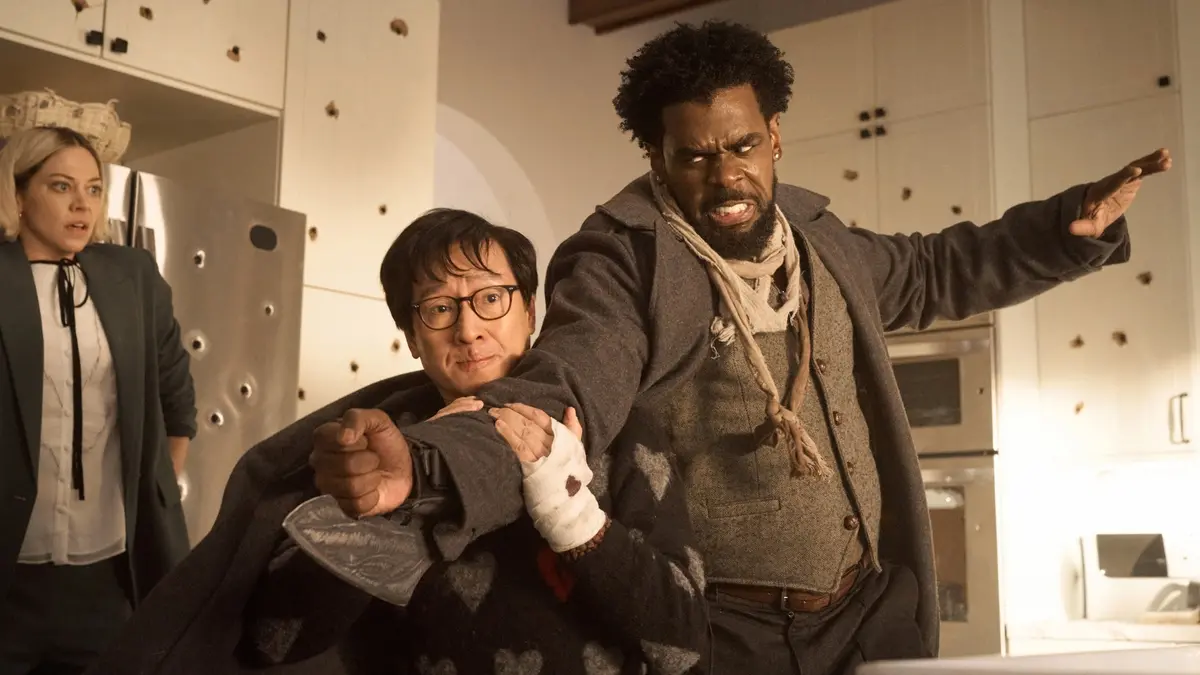 Lio Tipton as Ashley, Ke Huy Quan as Marvin Gable and Mustafa Shakir as The Raven in LOVE HURTS, directed by JoJo Eusebio ©Universal Studios. All Rights Reserved.