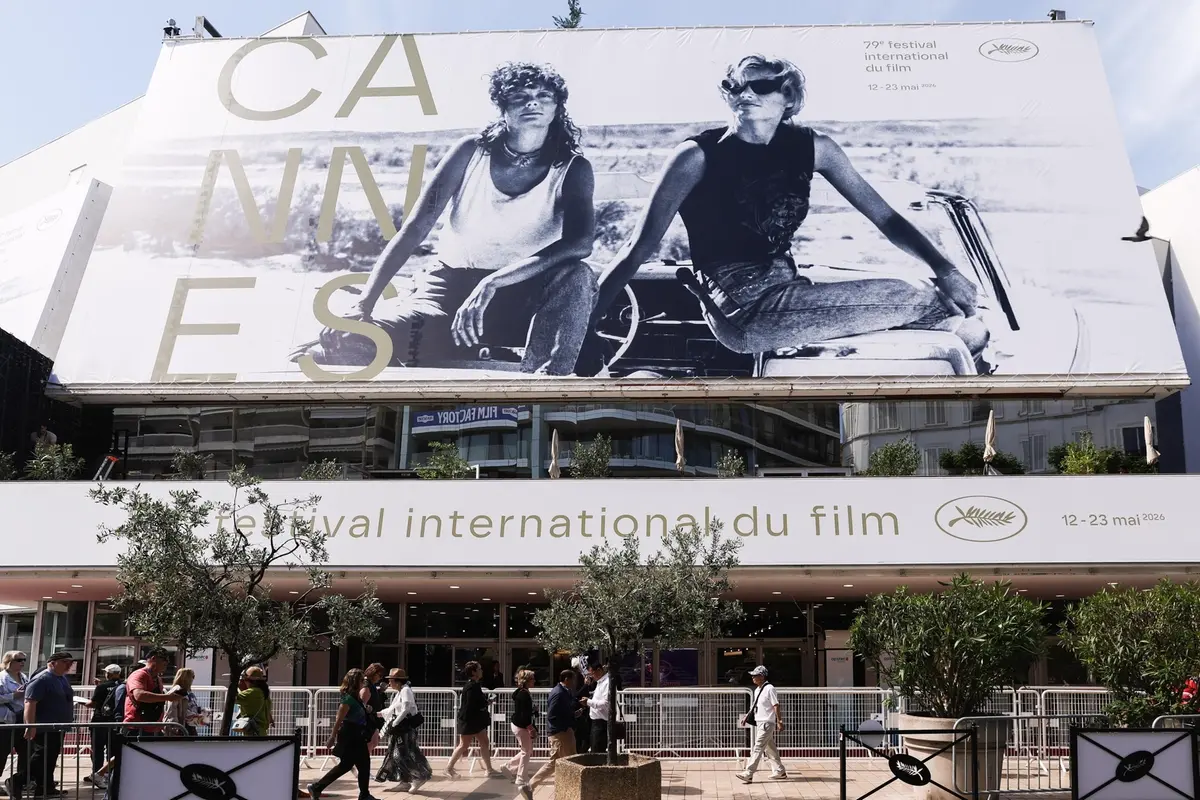 epa12947078 The poster for the 79th edition of the Cannes Film Festival hangs on the facade of the Palais des Festivals one day before the beginning of the 79th Cannes Film Festival in Cannes, France, 11 May 2026. The film festival runs from 12 to 23 May 2026. EPA/TERESA SUAREZ , EPA