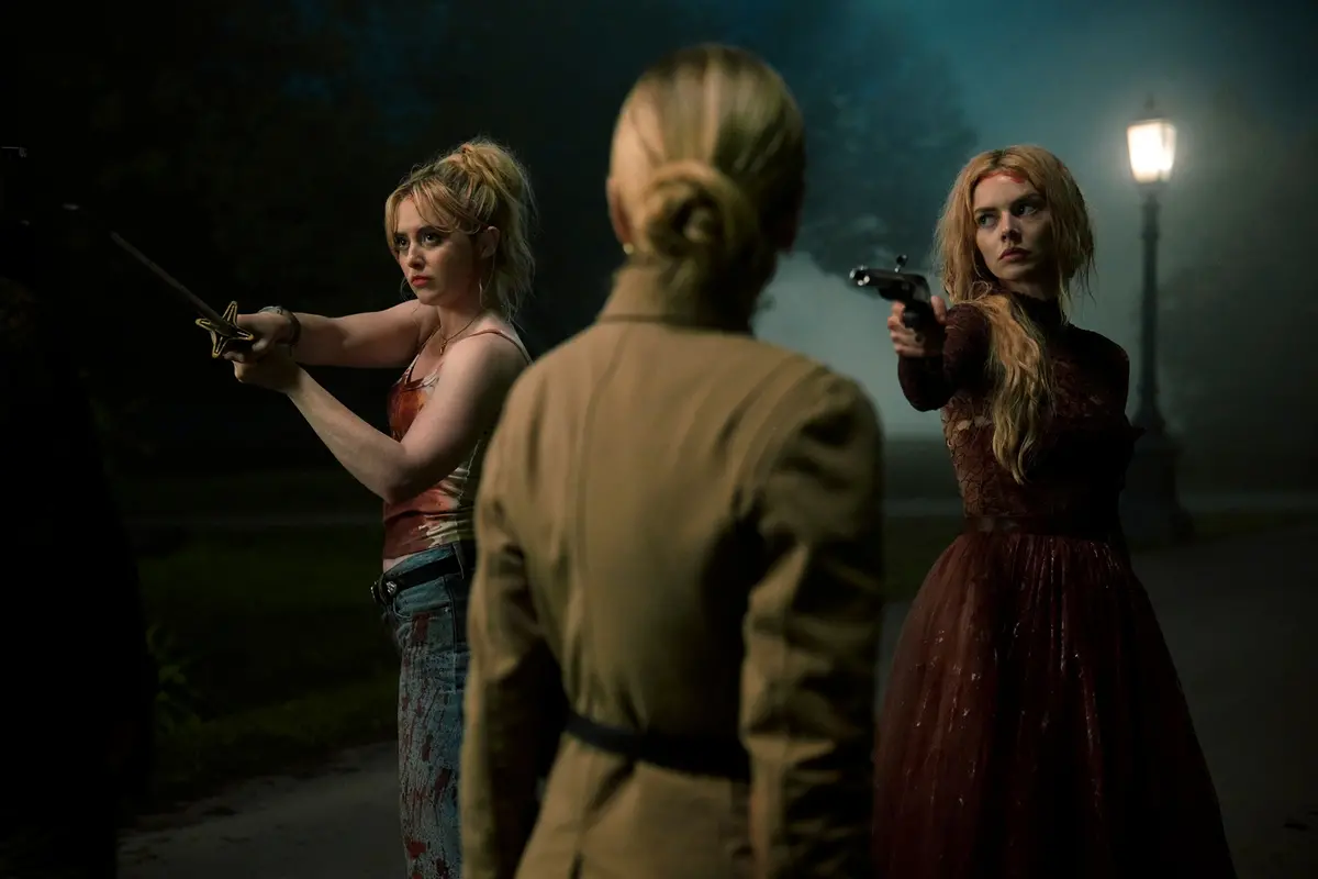 From L to R: Kathryn Newton, Sarah Michelle Gellar, and Samara Weaving in READY OR NOT 2: HERE I COME. Photo by Searchlight Pictures/Pief Weyman, Courtesy of Searchlight Pictures. © 2026 Searchlight Pictures. All Rights Reserved.