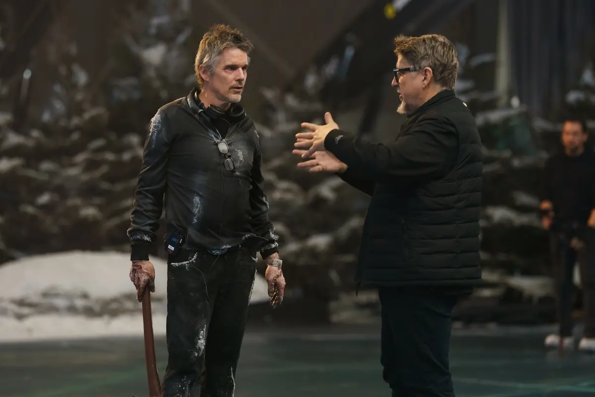(from left) Ethan Hawke and director Scott Derrickson on the set of Black Phone 2. \\u00A9 2025 Universal Studios. All Rights Reserved.