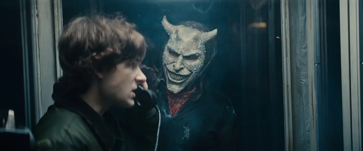 (from left) Finn (Mason Thames) and The Grabber (Ethan Hawke) in Black Phone 2, directed by Scott Derrickson. © 2025 Universal Studios. All Rights Reserved.