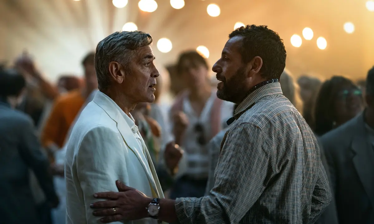 Jay Kelly. (L-R) George Clooney as Jay Kelly and Adam Sandler as Ron Sukenick in Jay Kelly. Cr. Peter Mountain/Netflix © 2025.