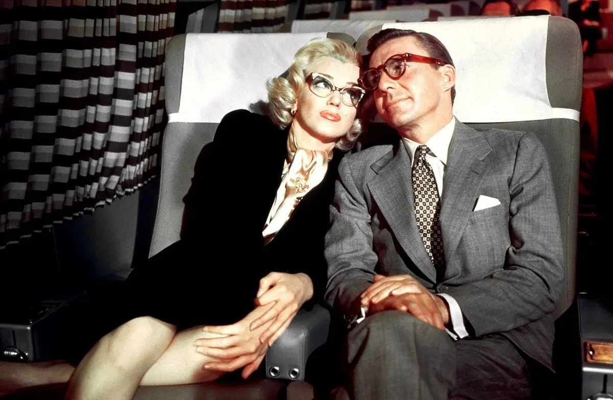 Marilyn Monroe e David Wayne in Come sposare un milionario