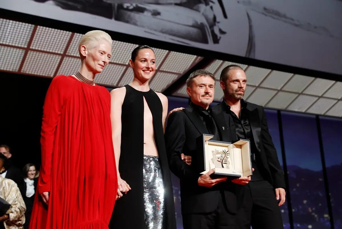 epa12988313 (L-R) Tilda Swinton onstage with Renate Reinsve, Cristian Mungiu, and Sebastian Stan as they accept the Palme d'Or (Golden Palm) for 'Fjord' during the closing ceremony of the 79th annual Cannes Film Festival, in Cannes, France, 23 May 2026. The film festival runs from 12 to 23 May 2026. EPA/TERESA SUAREZ