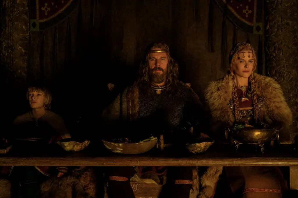 4179_D086_00013_RC2 (l to r.) Oscar Novak stars as Young Amleth, Ethan Hawke as King Aurvandil and Nicole Kidman as Queen Gudrún in director Robert Eggers’ Viking epic THE NORTHMAN, a Focus Features release. Credit: Aidan Monaghan / © 2022 Focus Features, LLC