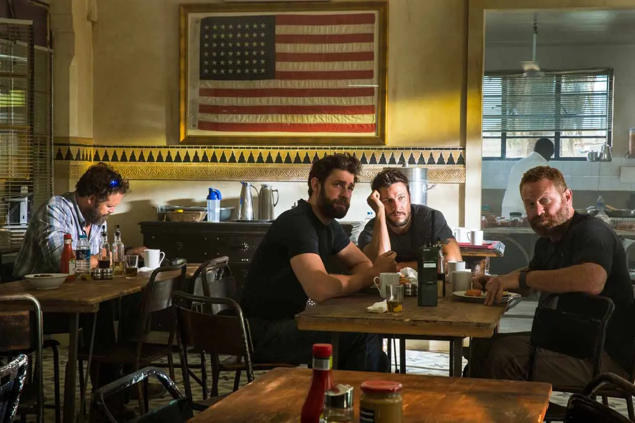 Left to right: David Denman plays Dave \"Boon\" Benton, John Krasinski plays Jack Silva, Pablo Schreiber plays Kris \"Tanto\" Paronto and Max Martini plays Mark \"Oz\" Geist in 13 Hours: The Secret Soldiers of Benghazi from Paramount Pictures and 3 Arts Entertainment / Bay Films in theatres January 15, 2016.